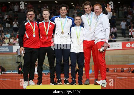 James BALL of Wales along with his pilot Matthew Rotherham (Silver), Neil FACHIE of Scotland along with his pilot Lewis Stewart (gold), Stephen BATE of England along with his pilot Christopher Latham (Bronze) in the Men's Tandem B - 1000m Time Trial - Final cycling at the 2022 Commonwealth games in the Velodrome, Queen Elizabeth Olympic Park, London. Stock Photo
