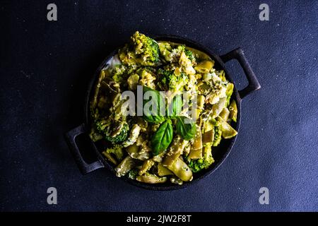 Top view summer vegetables with eggs and basil served in a bowl Stock Photo