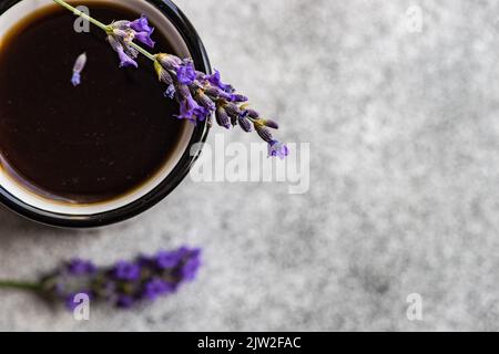 Top view of espresso coffee with lavender on concrete background Stock Photo