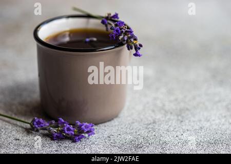 Close-up espresso coffee with lavender on concrete background Stock Photo
