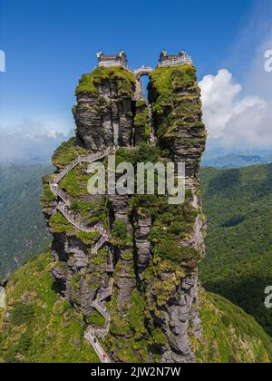 Fanjingshan mountain scenery with view of the new golden summit with ...