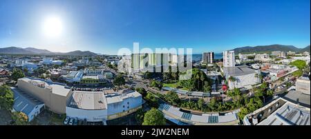 Aerial panorama of cityscape with ocean and perfect blue sky Stock Photo