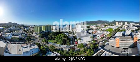 Aerial panorama of cityscape with ocean and perfect blue sky Stock Photo