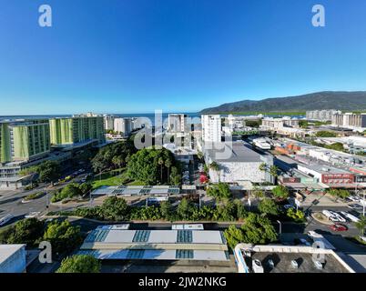 Aerial panorama of cityscape with ocean and perfect blue sky Stock Photo