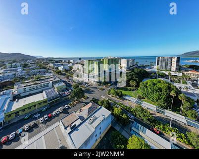 Aerial panorama of cityscape with ocean and perfect blue sky Stock Photo