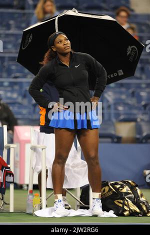 Queens, United States Of America. 07th Sep, 2011. FLUSHING NY- SEPTEMBER 7: Serena Williams of the United States waits in a rain delay against Anastasia Pavlyuchenkova from Russia during their Women's Quarterfinal 2011 US Open match at the USTA Billie Jean King National Tennis Center in New York on September 7, 2011 in in Flushing Queens People: Serena Williams Credit: Storms Media Group/Alamy Live News Stock Photo