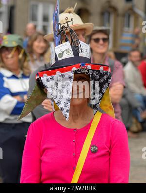 Bridport, Dorset, UK.  3rd September 2022.   A cycling themed hat at the Bridport Hat festival in Dorset  Picture Credit: Graham Hunt/Alamy Live News Stock Photo