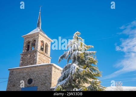 Snow covered church. Somosierra, Madrid province, Spain. Stock Photo