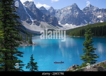 Moraine Lake with emerald green color nestled in the spectacular Valley of the Ten Peaks in the Rocky Mountains Banff National Park in Canada. Stock Photo
