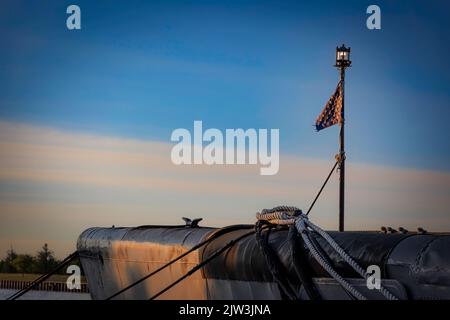 A Union Jack blows in the wind on the bow of the USS Cobia, a World War submarine now part of the Wisconsin Maritime Museum in Manitowoc, Wisconsin Stock Photo