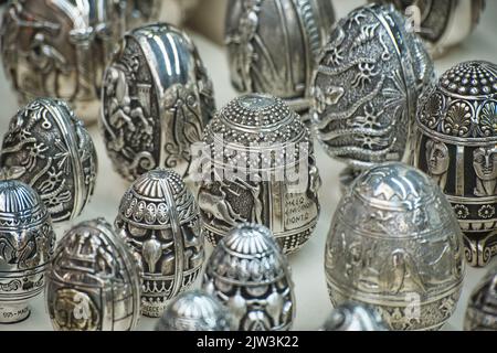 Close up of a collection of decorated eggs of silver in a jewelry store in Athens Stock Photo