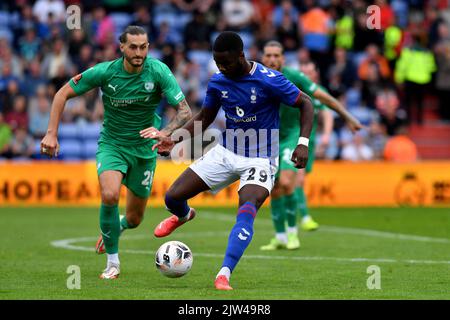 Junior Luamba of Oldham Athletic tussles with Oliver Banks of Chesterfield Football Club during the Vanarama National League match between Oldham Athletic and Chesterfield at Boundary Park, Oldham on Saturday 3rd September 2022. (Credit: Eddie Garvey | MI News) Credit: MI News & Sport /Alamy Live News Stock Photo