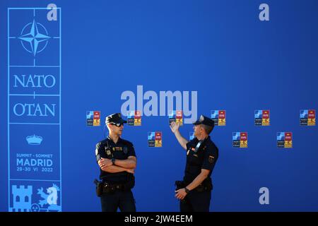 Spain, Madrid - 29 June, 2022: Spanish security police officers guard the NATO summit in Madrid, Spain. Stock Photo