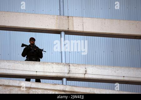 Spain, Madrid - 30 June, 2022: Spanish security police officer guards the NATO summit in Madrid, Spain. Stock Photo