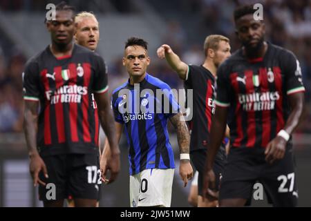 Milan, Italy, 3rd September 2022. Lautaro Martinez of FC Internazionale is surround by the red and black shirt of AC Milan players at a corner kick during the Serie A match at Giuseppe Meazza, Milan. Picture credit should read: Jonathan Moscrop / Sportimage Stock Photo