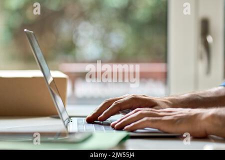 Business man hands typing on laptop keyboard working using computer.. Stock Photo