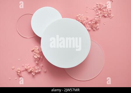 White podium for cosmetic product empty mockup ad on pastel background, flatlay. Stock Photo