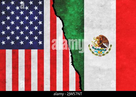 USA and Mexico painted flags on a wall with a crack. USA and Mexico relations. Mexico and United States of America flags together. USA vs Mexico Stock Photo