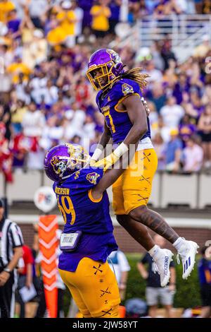 Greenville, NC, USA. 3rd Sep, 2022. East Carolina Pirates offensive lineman Noah Henderson (69) raises up East Carolina Pirates running back Rahjai Harris (47) after his touchdown in the fourth quarter against the North Carolina State Wolfpack in the NCAA football match up at Dowdy-Ficklen Stadium in Greenville, NC. (Scott Kinser/CSM). Credit: csm/Alamy Live News Stock Photo