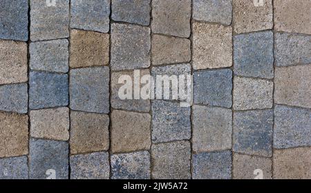 colored trapezoid concrete tiles pavement in high angle view - full frame background and texture Stock Photo