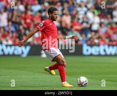 renan lodi   nottingham forest showing  refugee agency logo