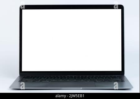 Slim gray laptop front view with clean screen isolated on studio background Stock Photo
