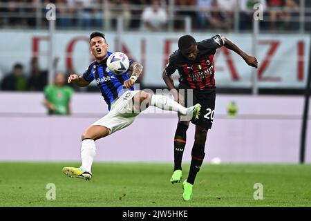 Lautaro Martinez (Inter)Pierre Kalulu (Milan) during the Italian 'Serie A' match between Milan 3-2 Inter at Giuseppe Meazza Stadium on September 3, 2022 in Milano, Italy. Credit: Maurizio Borsari/AFLO/Alamy Live News Stock Photo