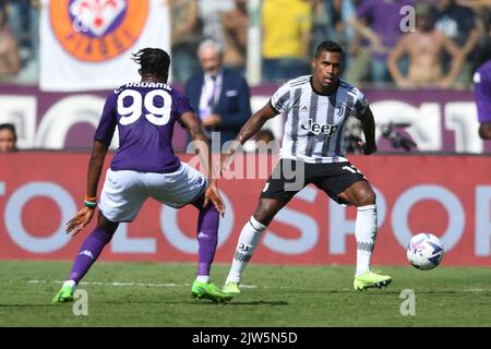 Christian Kouame of ACF Fiorentina and Alex Sandro of Juventus FC compete  for the ball during the Serie A football match between Juventus FC and ACF  Stock Photo - Alamy