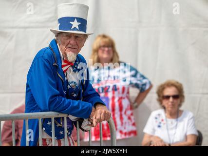 Wilkes Barre Township, United States. 03rd Sep, 2022. A man dressed as Uncle Sam waits outside of a Trump rally. Former President Donald Trump held a rally in Wilkes-Barre-Barre Township. an estimated 10,000 people attended. much of the parking lot was a line of people waiting to get inside. Credit: SOPA Images Limited/Alamy Live News