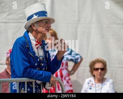 A man dressed as Uncle Sam waits outside of a Trump rally. Former President Donald Trump held a rally in Wilkes-Barre-Barre Township. an estimated 10,000 people attended. much of the parking lot was a line of people waiting to get inside. (Photo by Aimee Dilger / SOPA Images/Sipa USA)