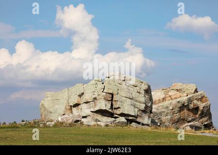 Okotoks Big Rock, the largest glacial erratic carried by glacier ice from Mount Edith Cavell, Rocky Mountains to the prairies during the Pleistocene Stock Photo