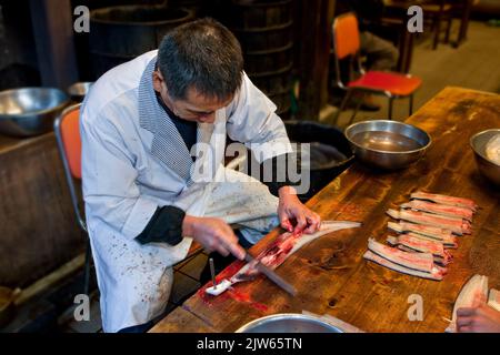 Preparing eel for cooking Narita Japan 2 Stock Photo