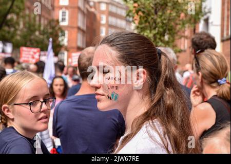 London, UK. 03rd Sep, 2022. A protester with painting on her face saying 'March For Life' takes part during the demonstration. Anti-Abortion activists and 'Pro Life' protesters marched through central London to Parliament Square to mark their opposition to the abortion law in the UK. Credit: SOPA Images Limited/Alamy Live News