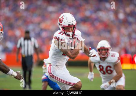 September 3, 2022: Utah Utes wide receiver Solomon Enis (21) move the ball up the field during the NCAA football game between the Utah Utes and the Florida Gators at Ben Hill Griffin Stadium Gainesville, FL. The Florida Gators defeat number 7 Utah Utes 29 to 26. Jonathan Huff/CSM. Stock Photo