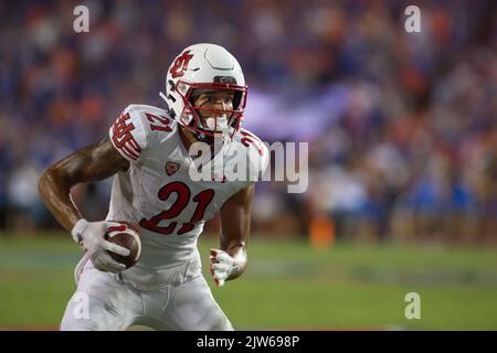 September 3, 2022: Utah Utes wide receiver Solomon Enis (21) moves the ball upfield during the NCAA football game between the Utah Utes and the Florida Gators at Ben Hill Griffin Stadium Gainesville, FL. The Florida Gators defeat number 7 Utah Utes 29 to 26. Jonathan Huff/CSM. Stock Photo