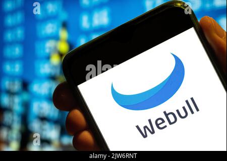 China. 25th July, 2022. In this photo illustration, the financial trading services company Webull logo is displayed on a smartphone screen. (Photo by Budrul Chukrut/SOPA Images/Sipa USA) Credit: Sipa USA/Alamy Live News Stock Photo