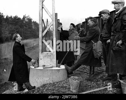 Image of placing a (concrete) top leading mast for the electrification of the Arnhem - Zwolle railway line at Gorssel. Stock Photo