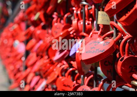 Red heart shaped padlocks. Little Venice, Colmar. France. Stock Photo