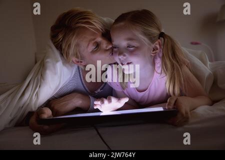 Mother and daughter using digital tablet Stock Photo