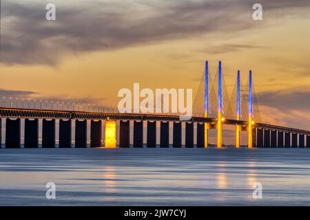 The famous Oresund bridge between Denmark and Sweden after sunset Stock Photo