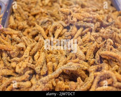 Deep fried pickled fish (Sour crispy fish) . Famous appetizer menu in THAILAND market. Stock Photo