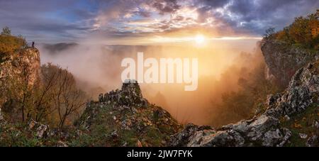 Beautiful autumn morning on the view point above the deep forest valley in Carpathian, Slovakia Stock Photo