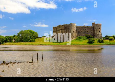 The 13th century Carew Castle ruins on the banks of the Carew River, Pembrokeshire, Wales, UK Stock Photo