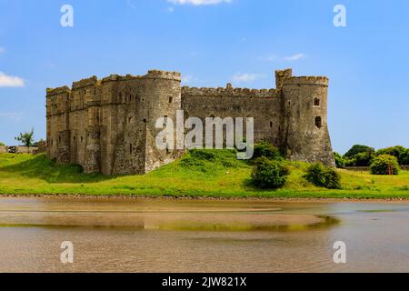 The 13th century Carew Castle ruins on the banks of the Carew River, Pembrokeshire, Wales, UK Stock Photo