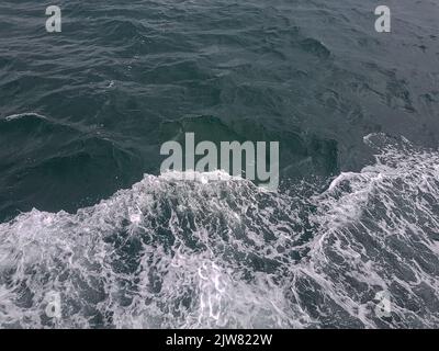 Surface of blue water Sea wave Colored background Stock Photo