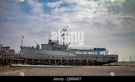 Retired former Royal Navy Minesweeper HMS Wilton repurposed as the headquarters of the Essex Yacht Club (EYC) at Leigh-on-Sea, Essex, UK. HMS Wilton w Stock Photo