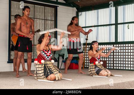 Maori dancers dressed in their traditional dance dress at a cultural ...