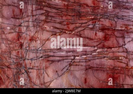 Cosmopolitan, natural quartzite background in perfect red tone for interior. Stock Photo