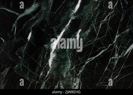 Verias Green Marble background, texture in dark color for interior. Stock Photo