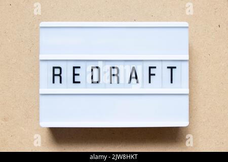 Lightbox with word redraft on wood background Stock Photo